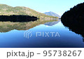 Autumn leaves reflected on the surface of the water Scenery of the mountains of Oku-Nikko and Lake Yunoko 95738267