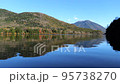 Autumn leaves reflected on the surface of Lake Yunoko Scenery of mountains and lakes in Oku-Nikko 95738270