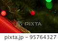 Colorful presents with bokeh on the background close up. 95764327