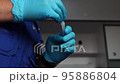 The doctor does an express test for a viral disease. Definition of the disease. medical testing. 95886804