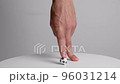 Figure of football player from and fingers stands on pedestal with toy ball 96031214
