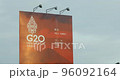 Red billboard and G20 indonesia summit 2022 logo against gray sky 96092164