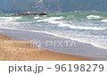 Ocean waves are blowing towards the shore. But there is a part that prevents sea waves from being too strong to affect the residence. 96198279