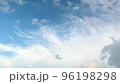 Time-lapse beautiful sky with moving clouds background. Puffy fluffy white clouds. Cloud time-lapse nature background. Cumulus cloud cloudscape timelapse. Nature weather blue sky with copy space. 96198298