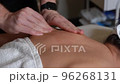 21 Therapeutic massage of the back and neck zone close-up slow-motion 96268131
