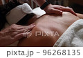 27 Therapeutic back massage top view close-up in slow motion 96268135
