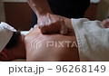 29 Therapeutic back massage from the side close-up slow-motion 96268149