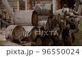 Wood set harvesting for traditional Russian bath. Short logs sawn and ready for splitting. Sauna backyard with fuel supply for long, cold season 96550024