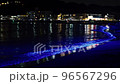 NightWave event on the Zushi coast, beach lit up in blue 96567296