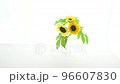 sunflowers on the windowsill 96607830