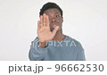 Disliking Young African Man doing Stop Gesture on White Background  96662530