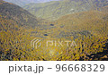 Drone flies over forest lake and mountain 96668329