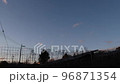 Airplane flying over solar power plant 96871354