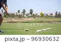 Driving Range Golf. Man practicing with golf club. Slow motion 96930632