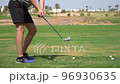 Driving Range Golf. Man practicing with golf club. Slow motion 96930635
