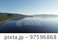 Summer morning aerial landscape of Lake Baikal is a rift lake located in southern Siberia, Russia Baikal lake summer landscape view. Drone's Eye View. 97596868