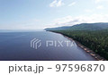 Summertime aerial imagery of Lake Baikal is a rift lake located in southern Siberia, Russia Baikal lake summer landscape view. Drone's Eye View. 97596870