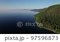 Summer morning aerial landscape of Lake Baikal is a rift lake located in southern Siberia, Russia Baikal lake summer landscape view. Drone's Eye View. 97596873