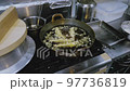 Japanese chef fry shrimp tempura 97736819