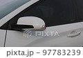Image of the left turn signal lamp illuminated in the driver's side mirror 97783239