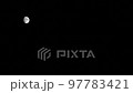 The bright moon in the dark night sky of Jeju Island 97783421