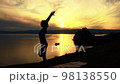A young girl does yoga in a beautiful place 98138550