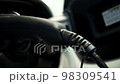 Electrical car recharging Modern electric car charging at the charger station, Electrical nozzle is inserted into an electrocar 98309541