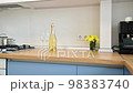 Modern blue-teal and white kitchen interior 98383740