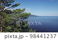 Summertime aerial imagery of Lake Baikal is a rift lake located in southern Siberia, Russia Baikal lake summer landscape view. Drone's Eye View. 98441237