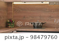 Closeup panorama of modern white and wooden beige kitchen interior 98479760