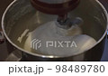 mix pizza dough with mixer 98489780