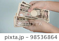 hand counting Japanese Yen banknote. Thousand Yen money. Japan cash, Tax, Recession Economy, Inflation, Investment, finance, savings, salary and payment concepts 98536864