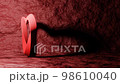 Red Twisted Rotating Heart in a Seamless Loop. Concept Wedding, Valentine's Day, Love Story,  Anniversary, Mother's Day, Marriage. 98610040