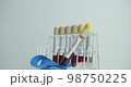 Slow motion, rotating sample splitter for analytical measurement in pharmacy laboratory, medical exposure. 98750225