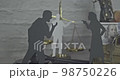 Silhouettes of couples discussing property rights with a mediator. Concept of divorce and discussion. 98750226