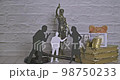 Silhouettes of couples discussing property rights with a mediator. Concept of divorce and discussion. 98750233