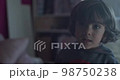 Cinematic close-up of 4-year-old Caucasian boy smiling at 4k camera. Slow Motion. 98750238