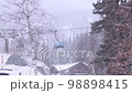 View on gondola lift in a ski resort on snowy beautiful day 98898415