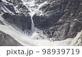 Snow avalanche in the mountains. Alps snow falling from high hills 98939719