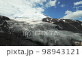 Drone view of Mount Elbrus flying over the rocks of Mount Cheget and Donguz-Orunbashi. 98943121