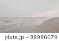 Aerial view on the empty sunset beach, Lisbon, Portugal Aerial view on the empty sunset beach, Lisbon, Portugal 98986079