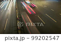 Car traffic close-up elevated view at night timelapse, Chengdu, Sichuan province, China 99202547