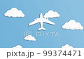 White paper planes fly to the top on a light blue background. stop motion, top view 99374471