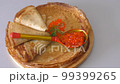 Pancakes with red caviar, cooked for Maslenitsa 99399265