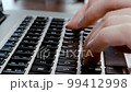 Woman's hands typing on a laptop keyboard, journalist typing article. Business analytics in bank sphere, daily report. 99412998