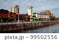 Malmo Central railway Station, water canal, blurred traffic at bright sunny day 99502556