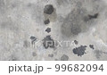 Stains of engine oil from cars that drip onto the cement floor 99682094