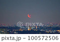 A red waning crescent moon crossing the Tokyo Skytree at midnight when the illuminations have disappeared in the direction of Komae City, Tokyo (age 24) 100572506