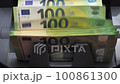 money counting machine. slow mo movement of one hundred euro banknotes 100861300