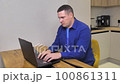 white male is surprised and frustrated looking at the laptop screen. 100861311